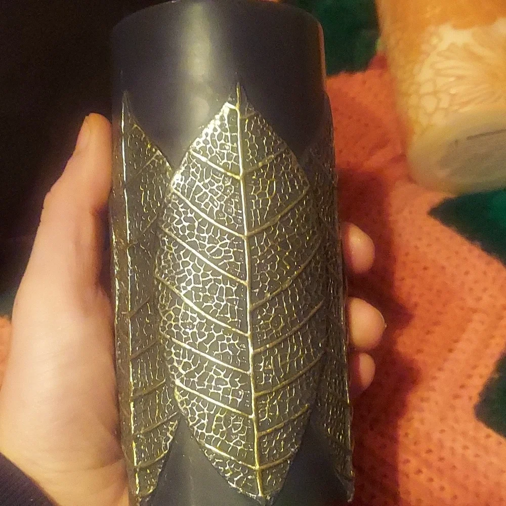Nwot premium unscented floral pillar candles. Set of 2.
